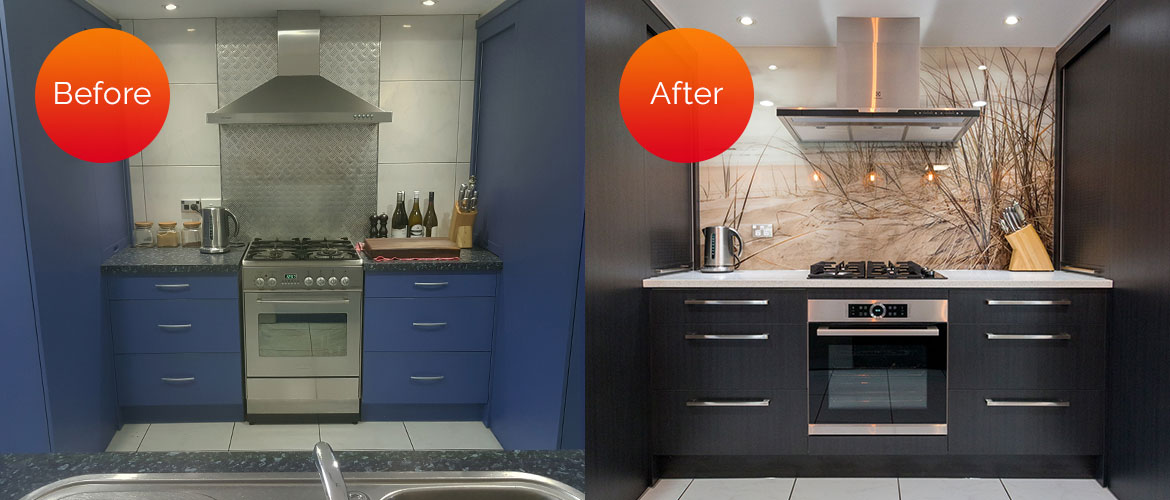 Blue kitchen updated to a sleek black look, featuring a statement beach-imagery backsplash.