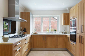 Traditional kitchen with wooden doors and drawers